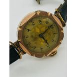 A swiss made gold vintage ladies watch.