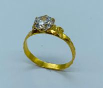 A 22ct yellow gold diamond ring