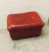 A mid century red leather pouffe