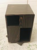 A contemporary Wenge display unit on a swivel base