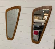 A pair of mid century wall hanging mirrors