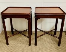 Two square occasional tables with crossband stretcher