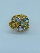 A Criso 18ct gold multi stoned ring