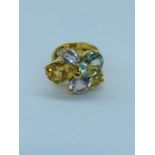 A Criso 18ct gold multi stoned ring