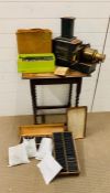 A vintage slide projector by Newton and Co scientific instrument makers, to include a large