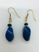 A pair of lapis lazuli and yellow metal drop earrings