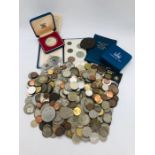 A selection of coins, tokens etc