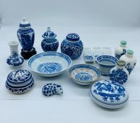 A selection of miniature blue and white Chinese porcelain