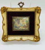 A framed miniature of a Courting couple.