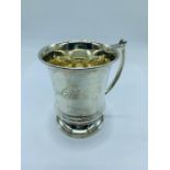 A small hallmarked silver cup, hallmarked Birmingham 1963-64