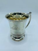 A small hallmarked silver cup, hallmarked Birmingham 1963-64