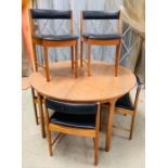 Mid century extendable dining table and six chairs from McIntosh 1970's