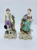 A pair of 18th century porcelain figures