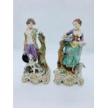 A pair of 18th century porcelain figures