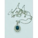 An 18ct white gold sapphire and diamond pendant necklace