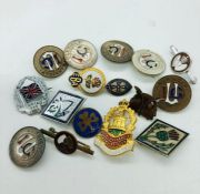 A small selection of pins and badges