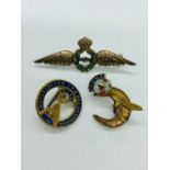 A selection of three RAF pins including a sweetheart brooch.