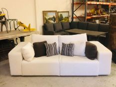 A large contemporary style cream sofa by Perobell (approx. W240cm D105cm H60cm)