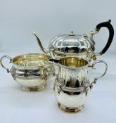 A Hallmarked silver tea set, comprising tea pot, sugar bowl and milk jug, hallmarked 1924-25 (