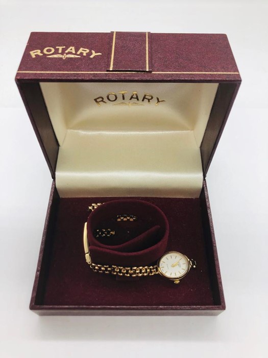 A ladies 9ct gold watch weighing 9.8g strap in case (AF)