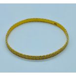 A single 22ct yellow gold bangle (11.9g)