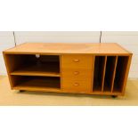 A teak style media unit