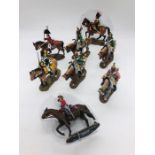A selection of mounted De Prado figures