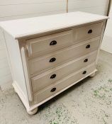 Two over three white chest of drawers on bun feet (H97cm D53cm W120cm)