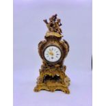 A Gilt mantel clock