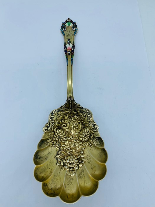 A Sterling silver spoon with enamel decoration