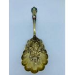 A Sterling silver spoon with enamel decoration
