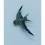 A silver and Plique a Jour brooch/pendant in the form of a swift