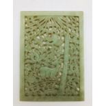 A Chinese Jade tile with a woodland theme.