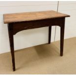 A hall table with tapered legs