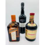 A bottle of 1999 Croft Port, a bottle of Drambuie and a bottle of Cointreau.