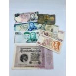 A small selection of Banknotes to include German, Iranian and Belgium.