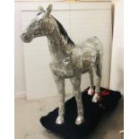 A stunning seven foot tall sculpture of a Horse, mirrored in a mosaic style