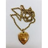 A 9ct gold heart shaped locket and chain.(total weight 6.2g)