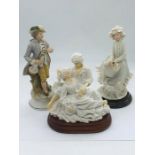 Three porcelain figurines