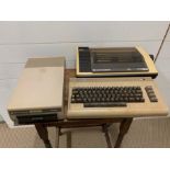 Commodore 64 keyboard, commodore 1541 single drive disk and Commodore mps 801 matrix printer