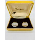 A pair of Mother of Pearl cufflinks, boxed.