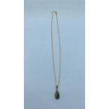 A 9ct gold necklace and pendant (approx weight 4g)