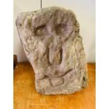 A Medieval stone head