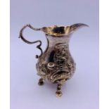 A small Silver milk jug, indistinct hallmarks. (95g)