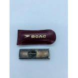 A BOAC silver, hallmarked, silver cigar cutter in original packet.