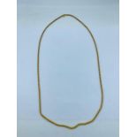 A 22ct gold necklace, rope design (21.8g)