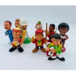 Nine plastic sportsman figurines