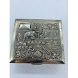 An Indian Silver embossed cigarette box