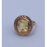 A Cocktail ring in a 9ct yellow gold mount