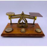 A Set of vintage Postal Scales with weights